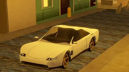 Un coupé blanco descapotable con aros dorados